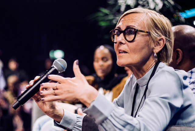 A woman giving a press conference